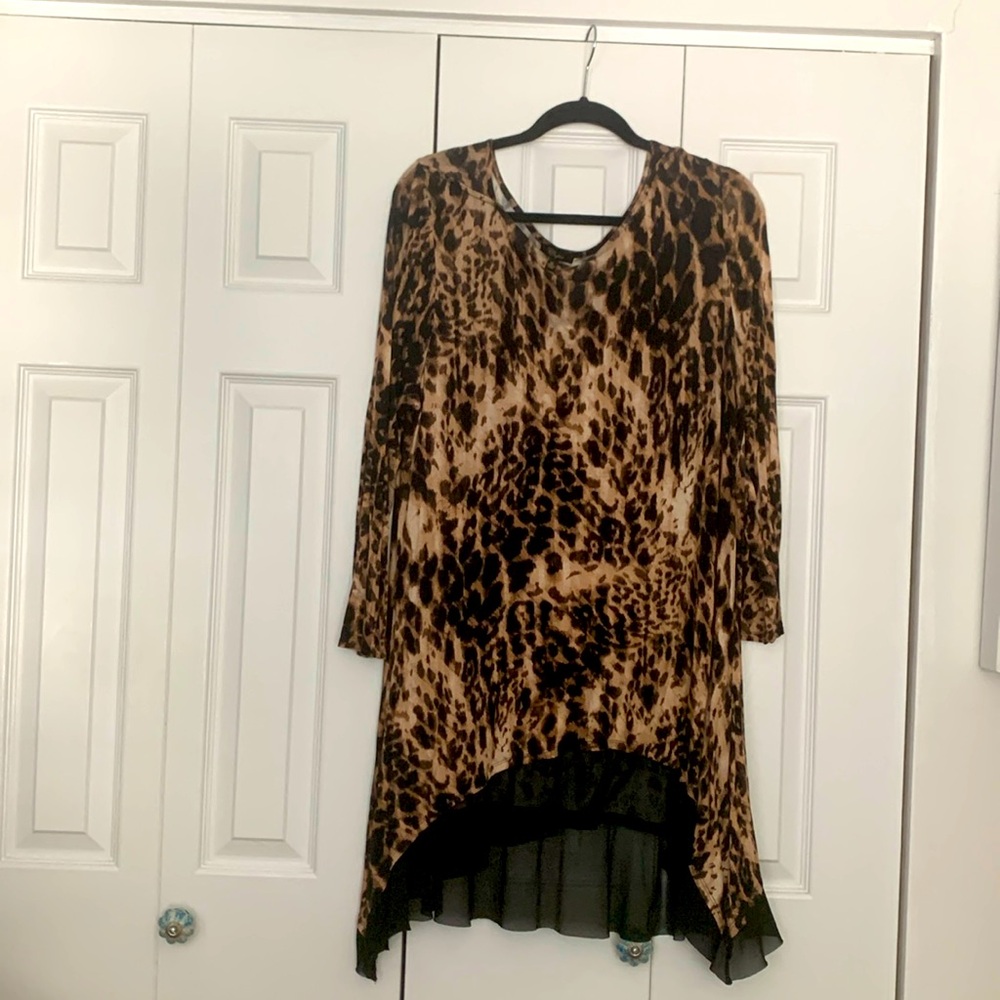 Long tunic leopard top with black mesh accent 33 inch front 37 back  20underarm